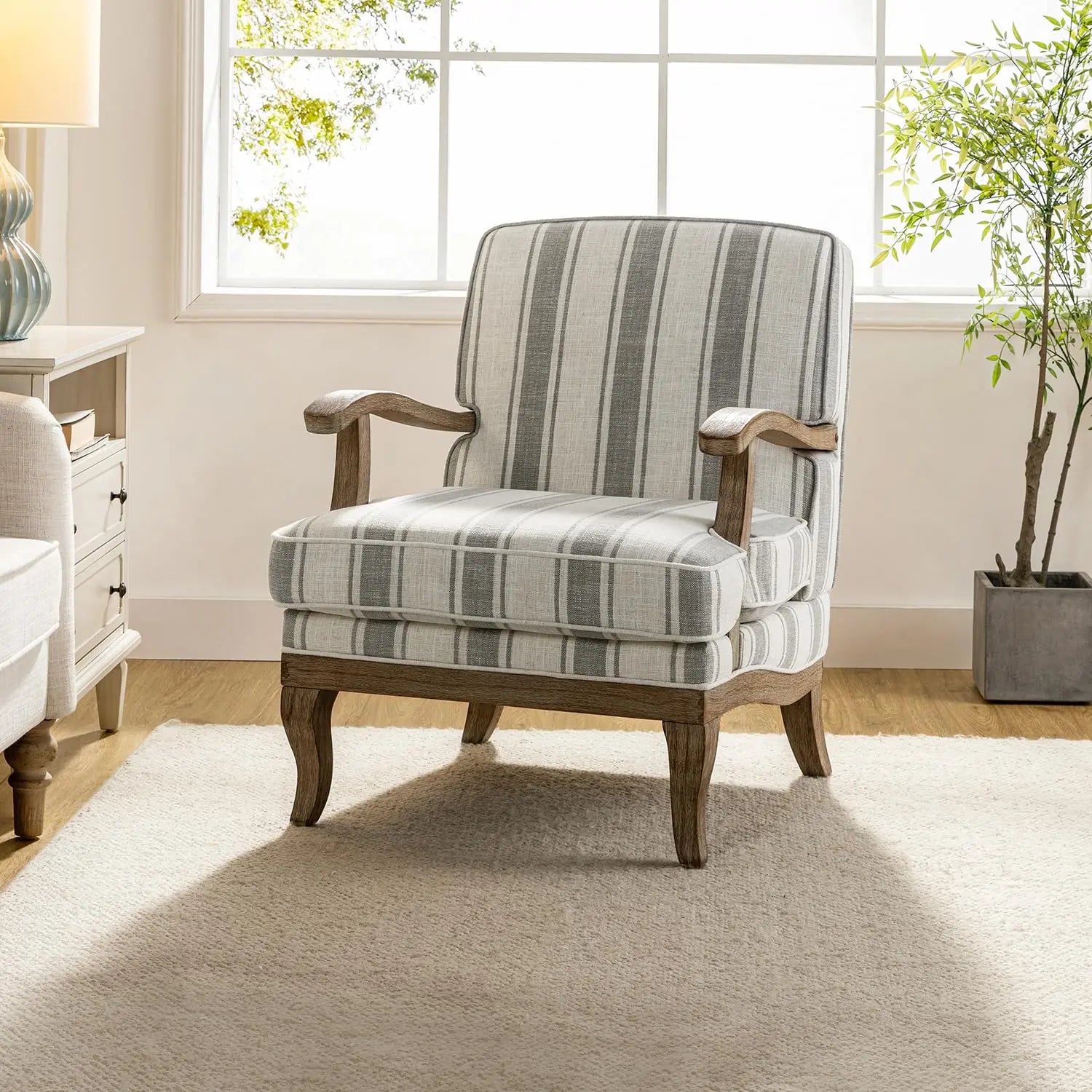Upholstered Accent Chair with Graceful Curves and Wooden Legs
